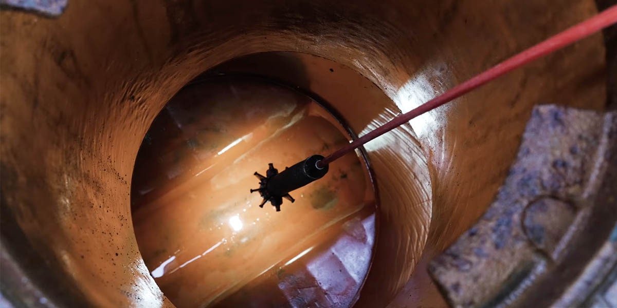 Duct cleaning services specialized equipment removing debris from commercial ductwork in Topeka Kansas